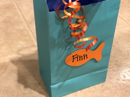 Goldfish Party Treat Bags - bag with fish attached, curly ribbon on handle
