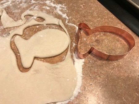 Goldfish Shaped Mini Pizzas - cutting out fish shapes from rolled dough