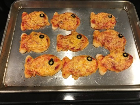 Goldfish Shaped Mini Pizzas - baked pizzas on the pan cooling