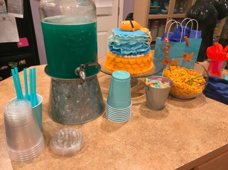 Blue Party Punch - party lay out with blue cups and clear ones with lids