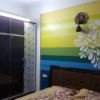 Curtain Color Advice for Multi-colored Wall - wall with horizontal blue, green, and yellow stripes
