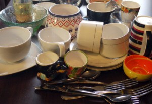 A collection of mismatched dishes from the thrift store.