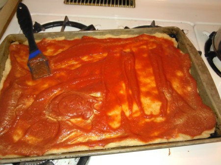 Homemade Pizza sauce on dough