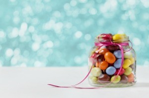 Baby Food Jar filled with colorful egg candy.