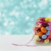 Baby Food Jar filled with colorful egg candy.