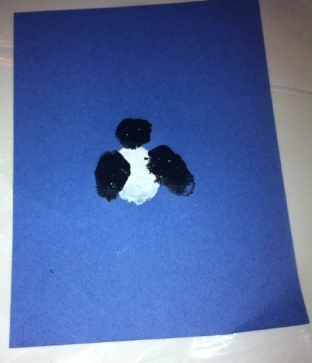 Fingerprint Penguin - use black paint and thumb to make wings and index finger to make the head
