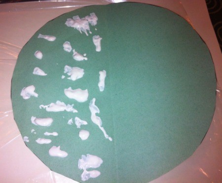 Rorschach Snowflakes - fold circle in half and then open up to add white paint to one half