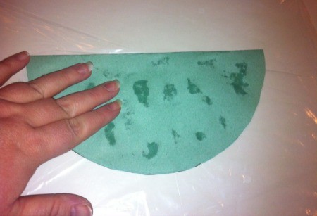 Rorschach Snowflakes - fold in half again and press down to spread paint