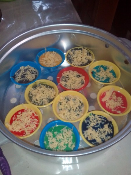 Put Cheese steaming pan filled with puto cups
