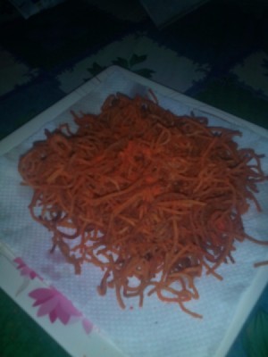 A plate of crunchy spaghetti with cheese.