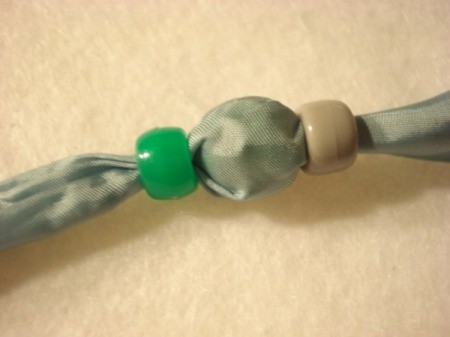 Bead and Fabric Necklace - add next external bead and continue