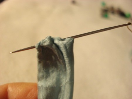 Bead and Fabric Necklace - once desired bead length is achieved sew up the ends of the tube