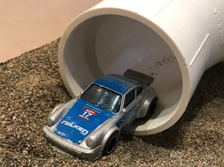 Indoor Sandbox - car coming out of the tunnel