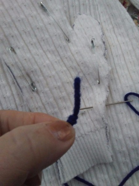 Cozy Mittens from Sweater - tie a knot in the end of the yarn