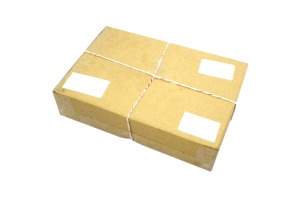 Closed cardboard Box or brown paper package box.