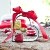 Heart cookie cutter with red bow.