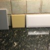 Kitchen Wall Paint Colour Advice - three tile samples against wall