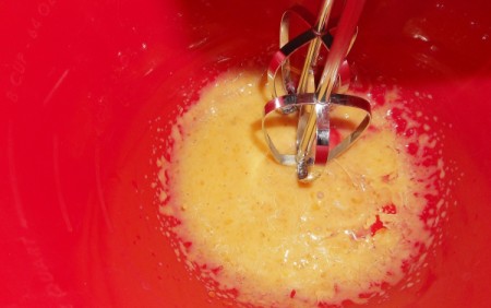 Beating eggs with mixer.
