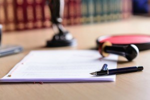 Power of Attorney documents on a desk.