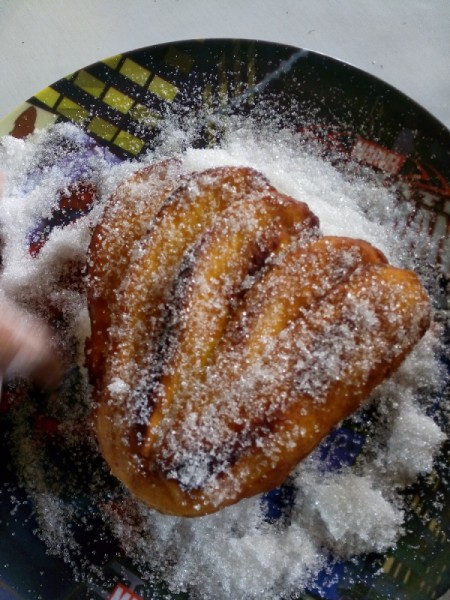 Fan fried banana dipped in sugar.