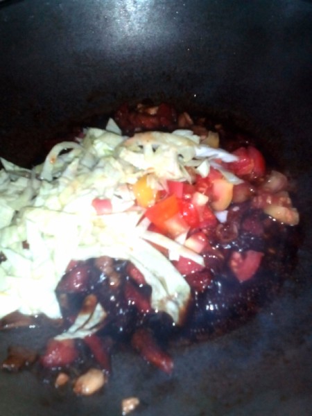 Pork & cabbage and tomato in pan of sweet sauce