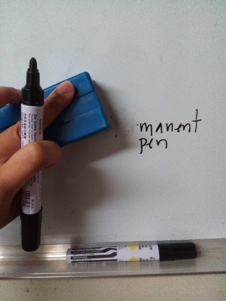 Erase whiteboard marker and the permanent pen beneath.
