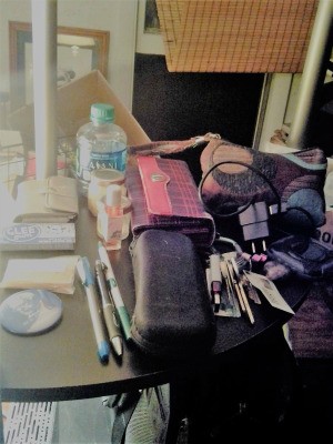 Empty Your Purse for Tidy Living - purse contents on a small table