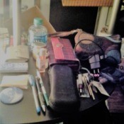 Empty Your Purse for Tidy Living - purse contents on a small table