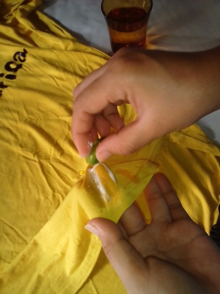 Lemon halves and powdered laundry detergent to remove a stain.