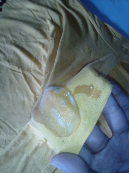 Lemon halves and powdered laundry detergent to remove a stain.