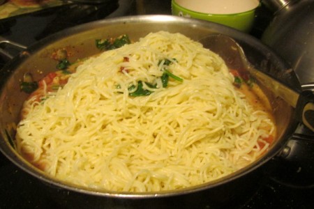 Pasta added to chicken mixture.