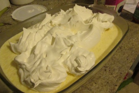 cool whip added to top of pan