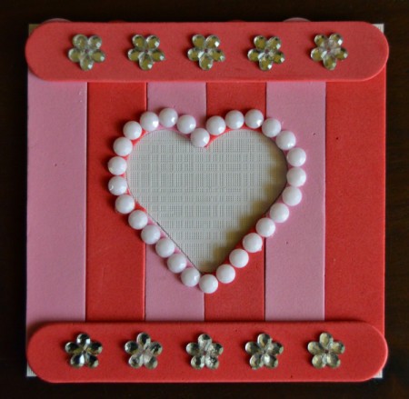 Pure Love Valentine's Day Magnetic Frame - glue 5 rhinestone flowers to the top and bottom foam sticks