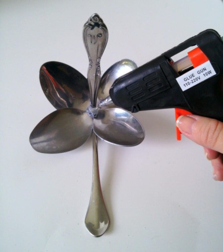 Spoon Flower - add more glue to front of petals and add one of the handles previously removed