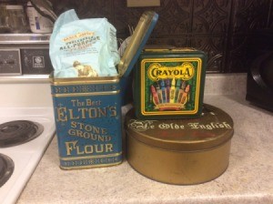A few vintage tins being reused to store food in the kitchen.