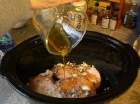 adding honey to chicken