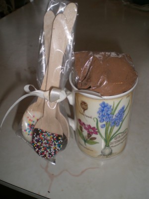 decorated chocolate spoons attached to cup