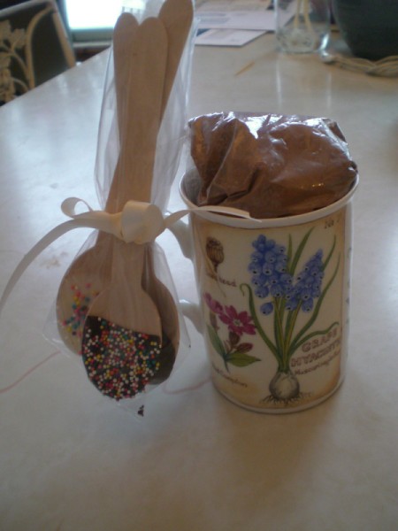 ataractic cup with decorated chocolate spoons tied to handle