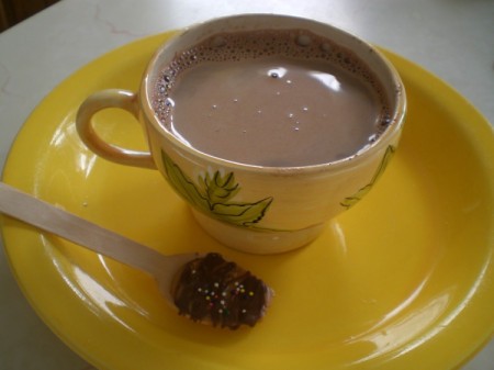 cup of cocoa with decorated spoon