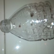Homemade Funnel - bottle cut in half to make a funnel