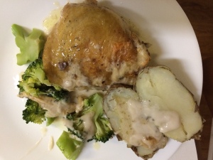 Chicken, potato and broccoli on plate