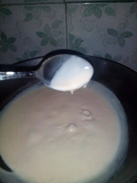 Staring milk and pudding together.