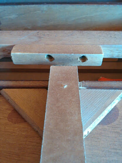 Recycled End Table as Canopy Pet Bed - removing support beam from table - closeup