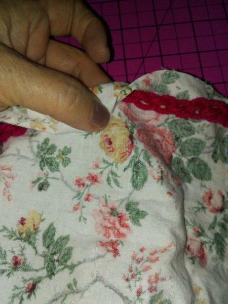 Small Fabric Bags with Crochet Drawstring - fold top over the drawstring and stitch, being careful not to sew through the string