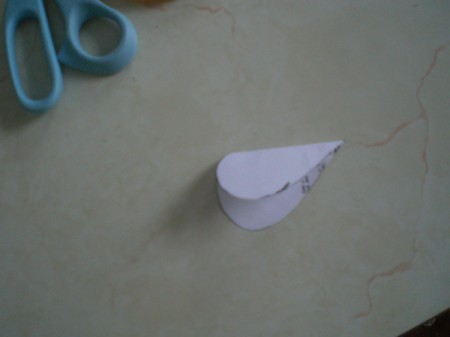 Easy Kids' Valentine Cards - cut out a heart shape from paper