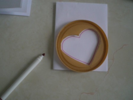 Easy Kids' Valentine Cards - tracing heart shape onto card