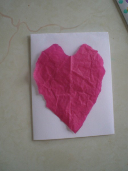 Easy Kids' Valentine Cards - placing tissue heart on card face