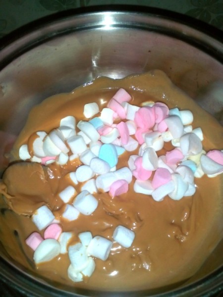 peanut butter and marshmallows in pan