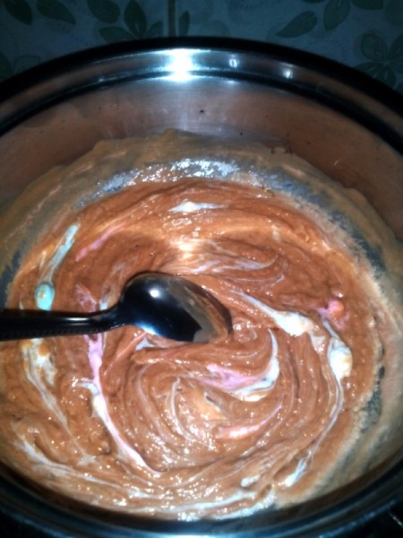 mixing melting marshmallows into peanut butter