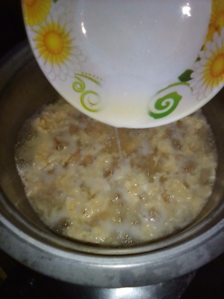 adding cornstarch mix to soup pot